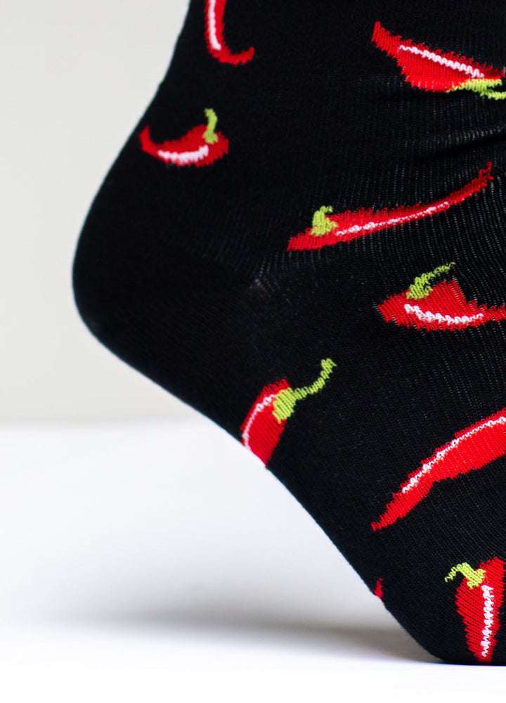 Black socks with chili on